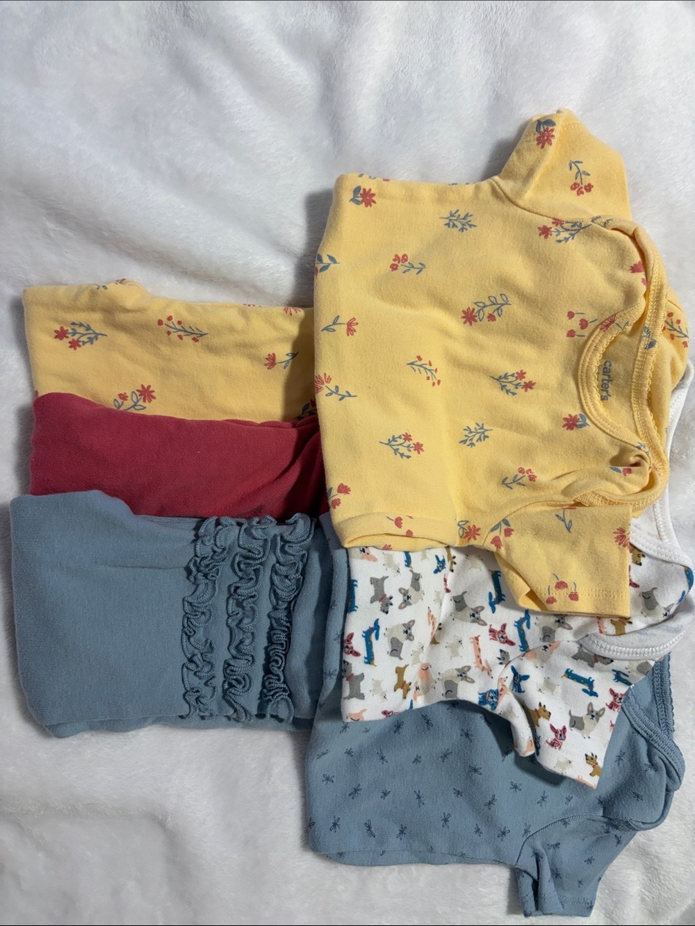 Carter's Yellow Floral Short-Sleeve Baby Bodysuit Set with Blue and Red Accents.